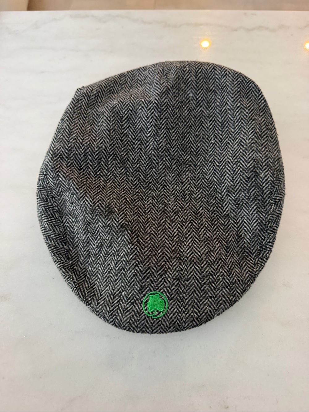 Men's Gray Herringbone Flat Cap with Green Clover Accent
